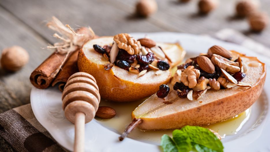 Sweet baked pears with honey, walnuts, almond cranberries and cinnamonpears, honey, walnuts, almond, cranberry, cinnamon, dried fruit, sweet, baked, roasted, halves, sliced, chopped, studded, sprinkled, topped, food, dish, meal, cuisine, gourmet, breakfast, brunch, dinner, dietary, dessert, sweet, snack, refreshment, seasonal, autumn, fall, nutritious, healthy, low, fat, calories, party, christmas, holiday, traditional, morning, aromatic, festive, stuffed, ground, ripe, filled, flavor, pears, honey, walnuts, almond, cranberry, cinnamon, dried fruit, sweet, baked, roasted, halves, sliced, chopped, studded, sprinkled, topped, food, dish, meal, cuisine, gourmet, breakfast, brunch, dinner, dietary, dessert, snack, refreshment, seasonal, autumn, fall, nutritious, healthy, low, fat, calories, party, christmas, holiday, traditional, morning, aromatic, festive, stuffed, ground, ripe, filled, flavor