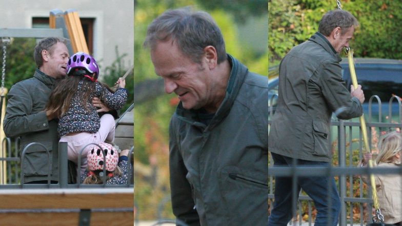 Donald Tusk z wnuczką na placu zabaw