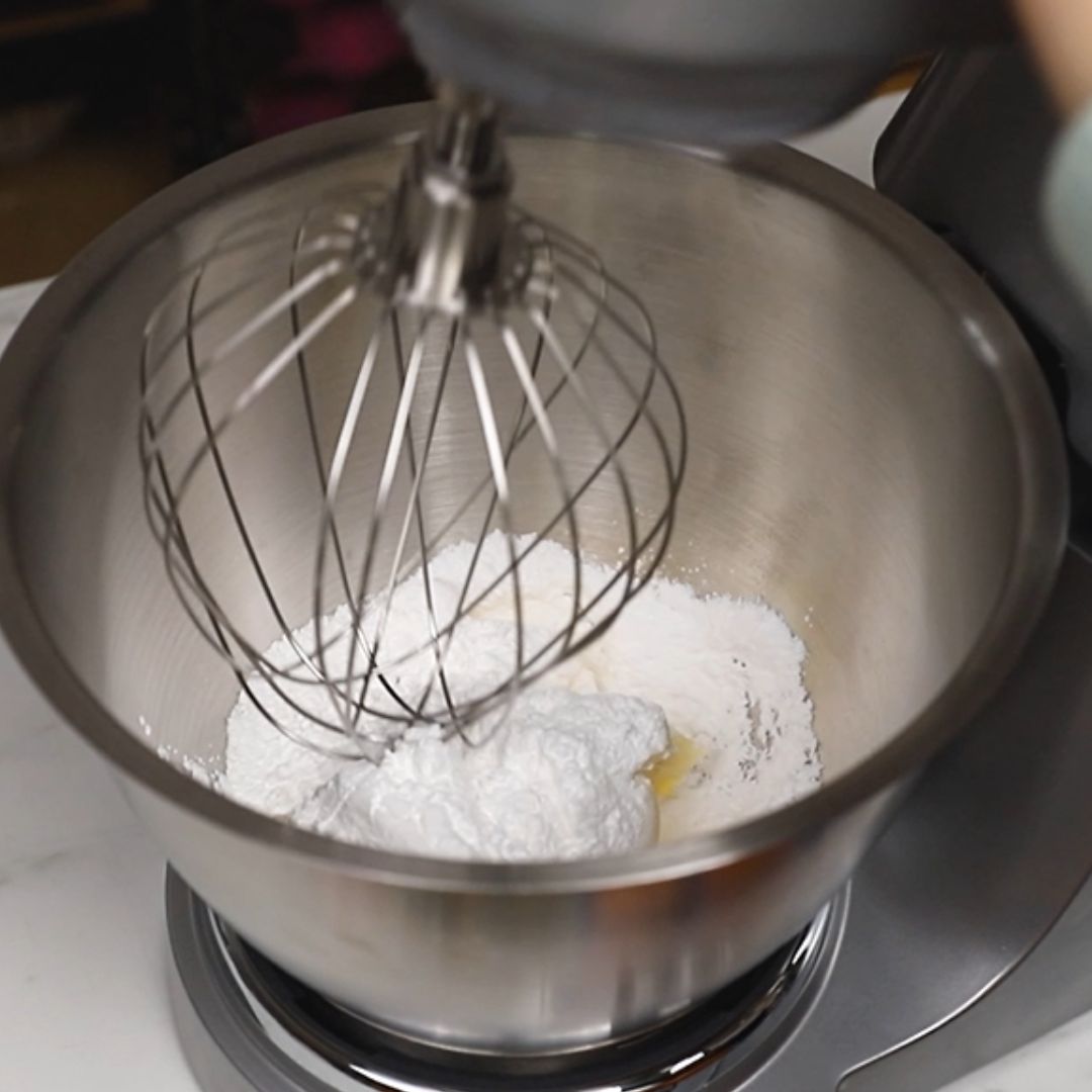 Next, I combine butter and powdered sugar in the mixer.