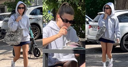 Naturalna Julia Wieniawa PAŁASZUJE śniadanie na mieście w dresowej bluzie z kapturem (ZDJĘCIA)
