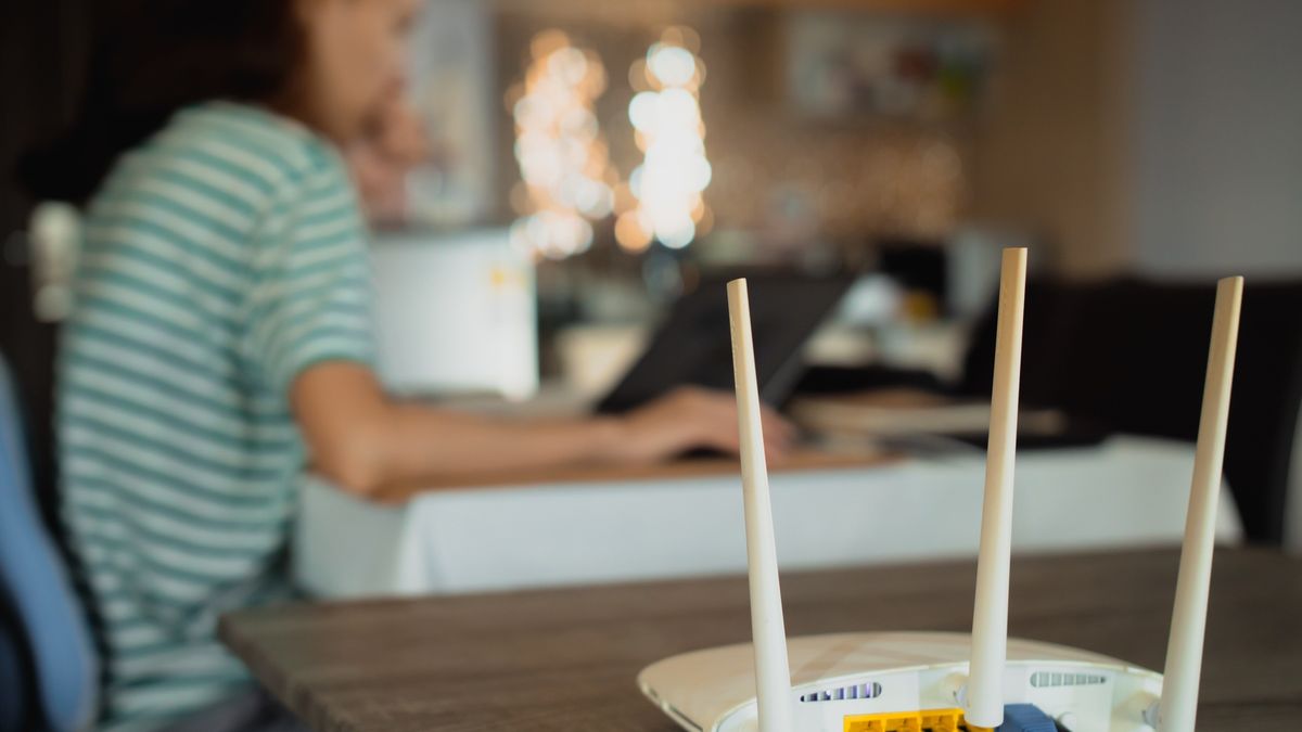 A woman is working at home using a modem router, connecting the Internet to her laptop.
A woman is working at home using a modem router, connecting the Internet to her laptop.
trumzz