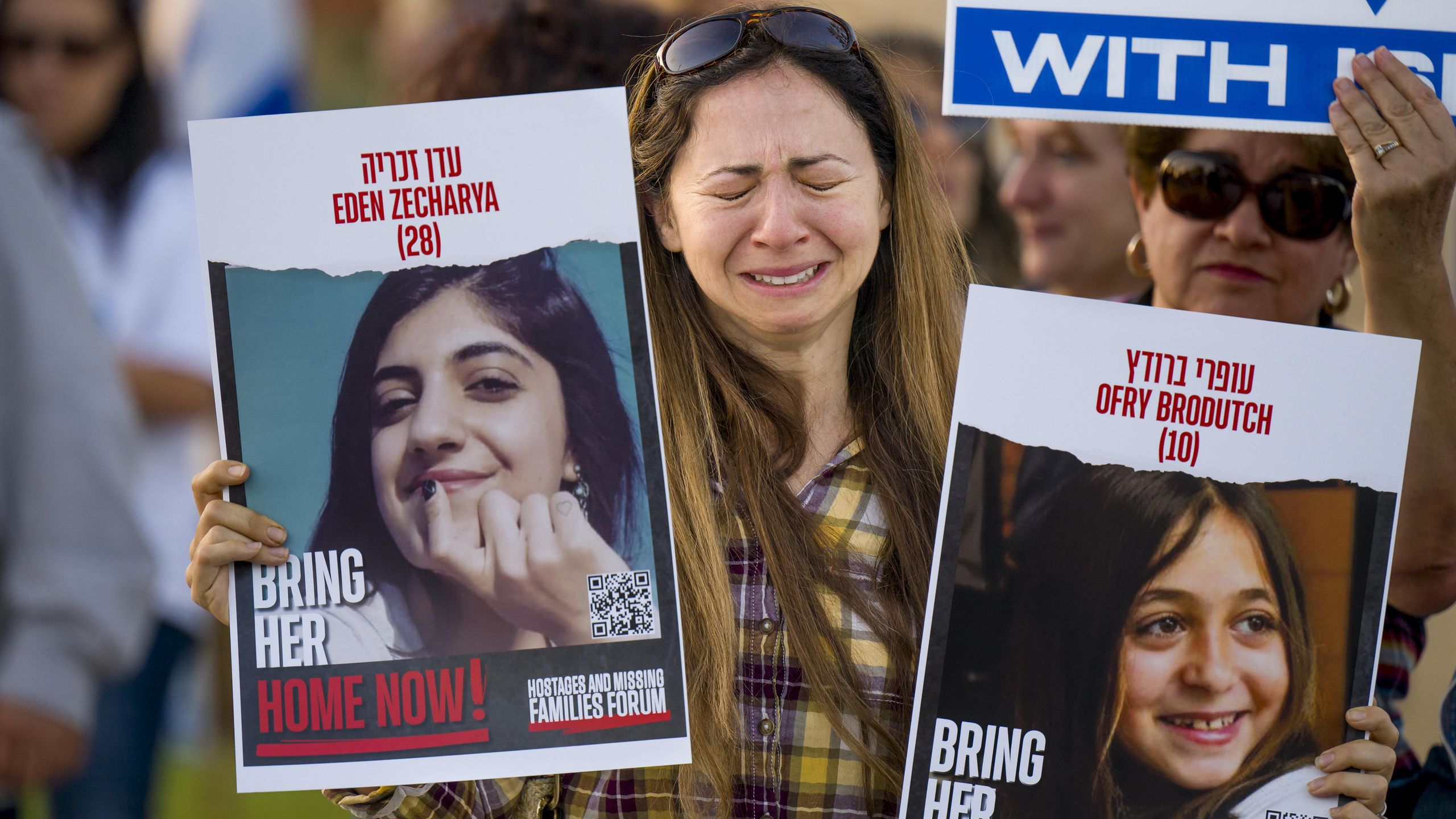 Vigil In Support For 200-plus Hostages Held Hostage By Hamas
IRVINE, CA - OCTOBER 26: Julia Heiman of Irvine is overcome with emotion as she holds posters of two girls being held hostage by Hamas during a vigil at the corner of Alton Parkway and Culver Drive in Irvine on Thursday, October 26, 2023 in support of the more than 200 people who were kidnapped in Israel earlier this month. "Its so painful to me that Israel has to defend its right to defend itself and to think of the brutality of what the children have endured," said Heiman. (Photo by Leonard Ortiz/MediaNews Group/Orange County Register via Getty Images)
MediaNews Group/Orange County Re
hamas, jewish, kidnapped