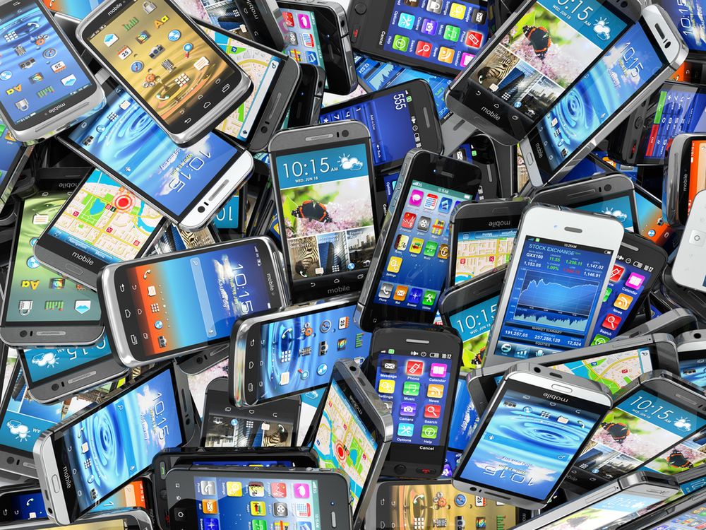 Mobile phones background. Pile of different modern smartphones. 3d