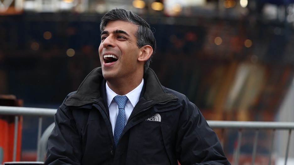 INVERNESS, SCOTLAND - MAY 23: Britain's Prime Minister Rishi Sunak reacts while talking to Leader of the Scottish Conservative party Douglas Ross (not pictured) as they visit the Port of Nigg on May 23, 2024 in Inverness, Scotland. The Prime Minister is on a General Election campaign visit to Inverness area with Scottish Conservative leader Douglas Ross. Yesterday, Sunak unexpectedly announced a UK general election for Thursday, 4 July. (Photo Jeff J Mitchell/Getty Images)