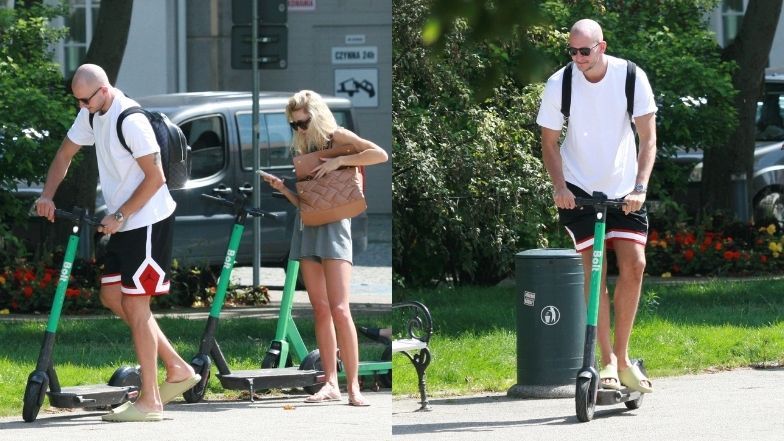 Bartosz Kurek w towarzystwie żony mknie hulajnogą po Sopocie i raczy się zimnym trunkiem