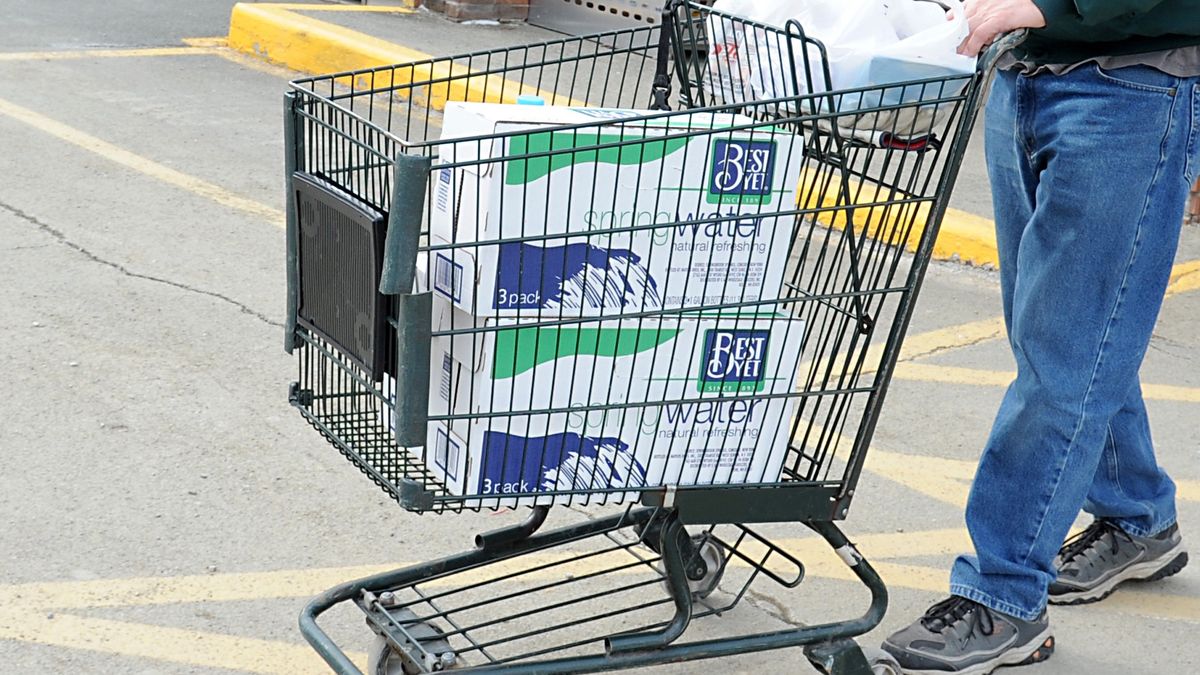 Mike McGuire of Hoosick Falls leaves a Topps grocery store with mostly water in his cart on Friday, Feb. 12, 2016 in Hoosick Falls, N.Y. McGuire has been a resident of Hoosick Falls for 63 years and worked at Saint-Gobain for 41 years. (Photo by Lori Van Buren/Albany Times Union via Getty Images)