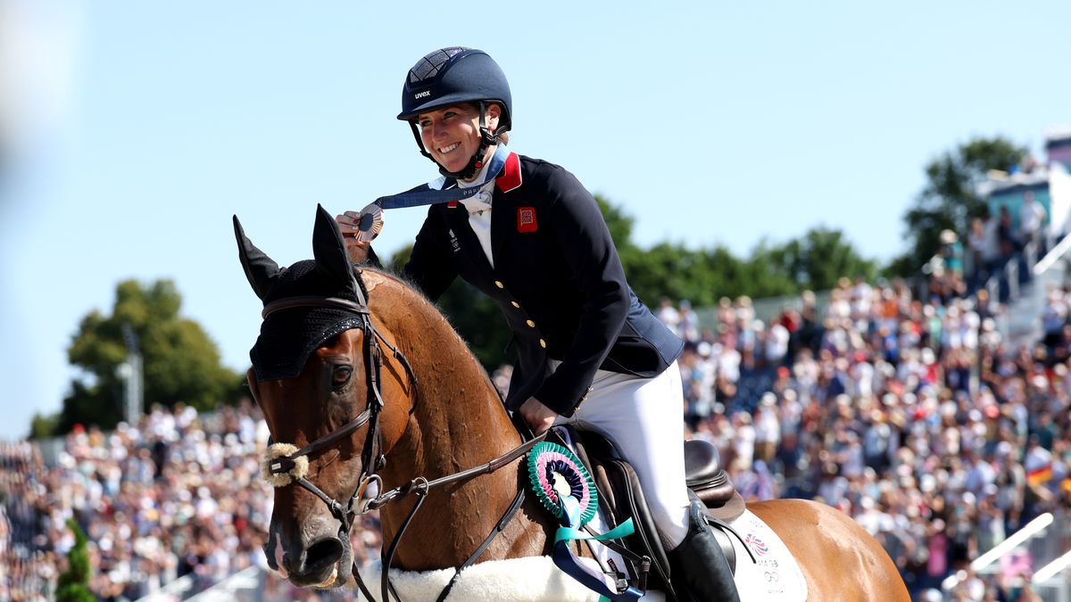 Equestrian - Olympic Games Paris 2024: Day 3
VERSAILLES, FRANCE - JULY 29: Bronze medalist Laura Collett with horse London 52 of Team Great Britain celebrates a lap of honour after the medal ceremony for the Eventing Individual Final on day three of the Olympic Games Paris 2024 at Chateau de Versailles on July 29, 2024 in Versailles, France. (Photo by Kevin C. Cox/Getty Images)
Kevin C. Cox
bestof, topix