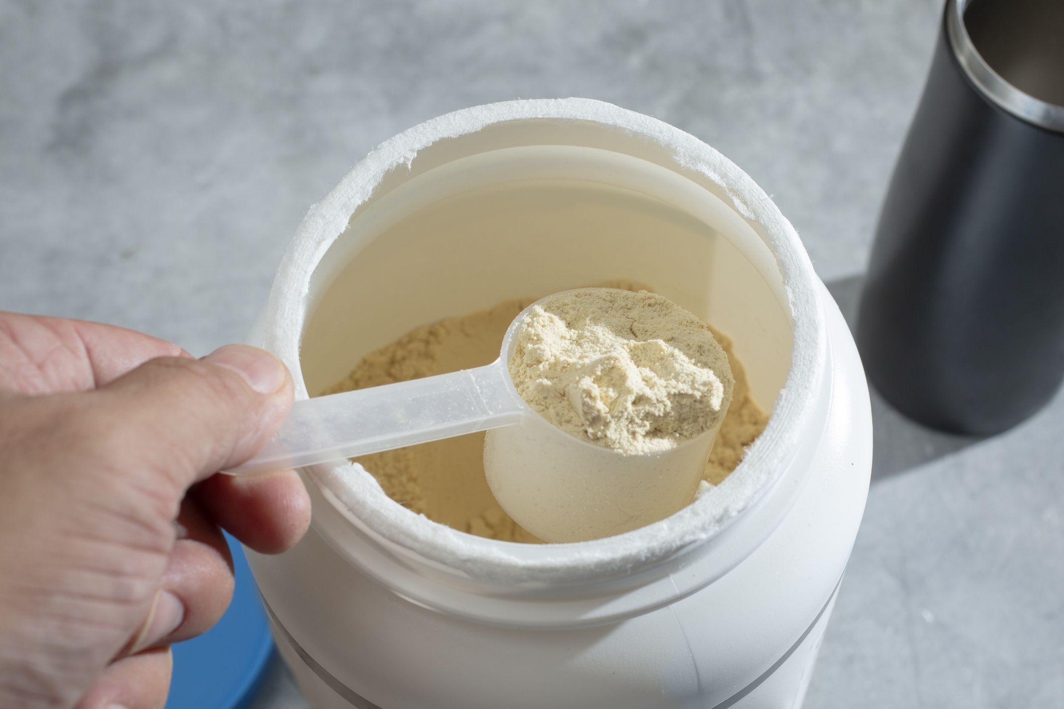 hand scoops protein powder
A view of a hand scooping some vegan protein powder out of a large container.
Photography By Tonelson
sports, energy, powder, bodybuilding, product, lifestyle, exercise, measurement, plastic scoop, vegetarian, body, supplement, diet, mass, nutrition, training, beverage, tub, health, shake, vegan