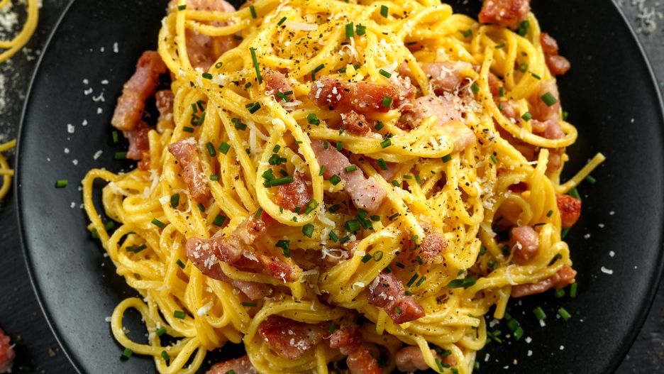 Classic Homemade Pasta carbonara Italian with Bacon, eggs, Parmesan Cheese on black plate.
Classic Homemade Pasta carbonara Italian with Bacon, eggs, Parmesan Cheese on black plate
carbonara, pasta, spaghetti, sauce, bacon, cheese, egg, cooking, creamy, eating, food, ham, meal, meat, parmesan, pepper, pork, spice, yolk, basil, cream, cuisine, dish, fork, italian, plate, recipe, traditional, rustic, fresh, noodles, background, close, closeup, cooked, detail, dinner, fettuccine, gastronomy, homemade, italy, lunch, mediterranean, nourishment, parsley, restaurant, table, tasty, white, wooden