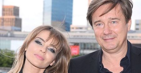 Zakochani Edyta Herbuś i Mariusz Treliński na pokazie mody. Aktorka postawiła na kusą mini [zdjęcia]