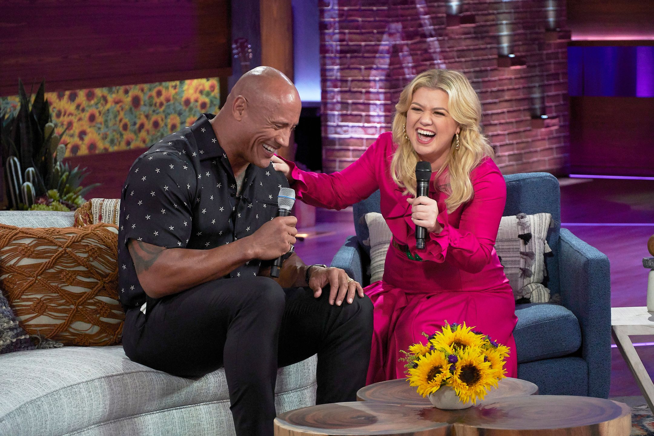 THE KELLY CLARKSON SHOW -- Episode 3010 -- Pictured: (l-r) Dwayne Johnson, Kelly Clarkson -- (Photo by: Adam Torgerson/NBCUniversal/NBCU Photo Bank) 