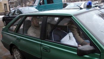Szuryga odwożony po przesłuchaniu