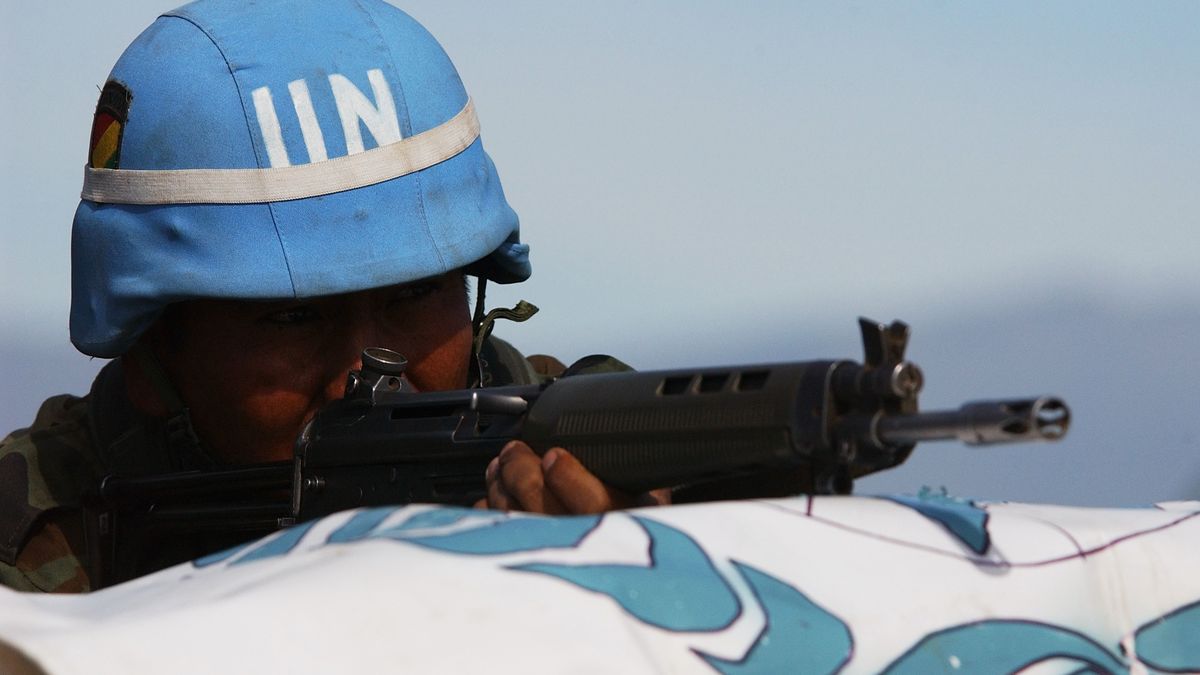 A Bolivian Army soldier prepares to fire during an Observation exercise, Oct. 21, 2002. The purpose of the training is to prepare for the Field Training Exercise portion of Cabanas 2002 Chile, held in Fuerte Lautaro, Chile. Cabanas 2002 Chile is a multinational combined readiness training exercise centered around peacekeeping operational tasks. This exercise provides an opportunity for over 1,300 military and civilian personnel from Argentina, Bolivia, Brazil, Chile, Colombia, Ecuador, Paraguay, Peru, Uruguay, and the United States to increase their state of readiness in combined multinational peacekeeping operations and a forum to encourage human rights. (U.S. Air Force photo by Senior Airman JoAnn S. Makinano) (Released)