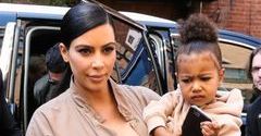Kim Kardashian z córką na pokazie Kanye Westa