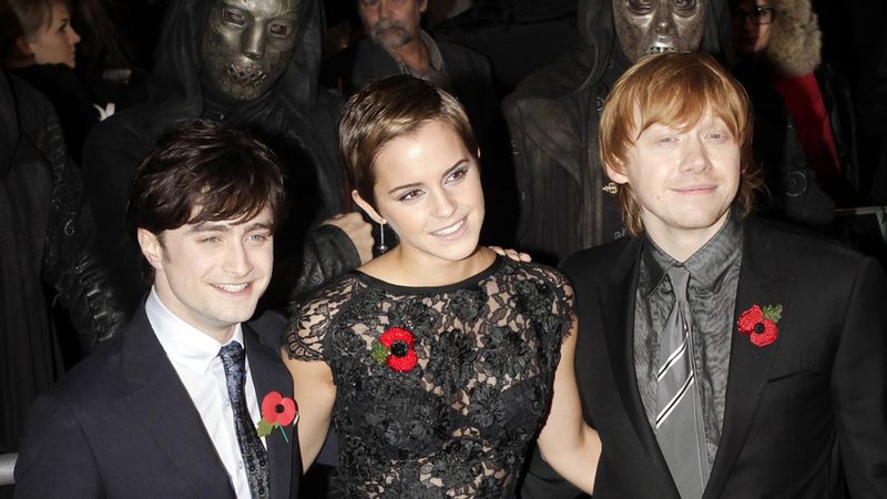 Actors Daniel Radcliffe (left), Emma Watson and Rupert Grint on the red carpet for the world premiere of the latest Harry Potter movie, "Harry Potter and the Deathly Hallows Part 1", in London, Britain, 11 November 2010.