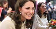Stylowa księżna Kate w uroczym płaszczyku na spotkaniu z dziećmi. W zakrywaniu ciążowego brzuszka nie ma sobie równych!