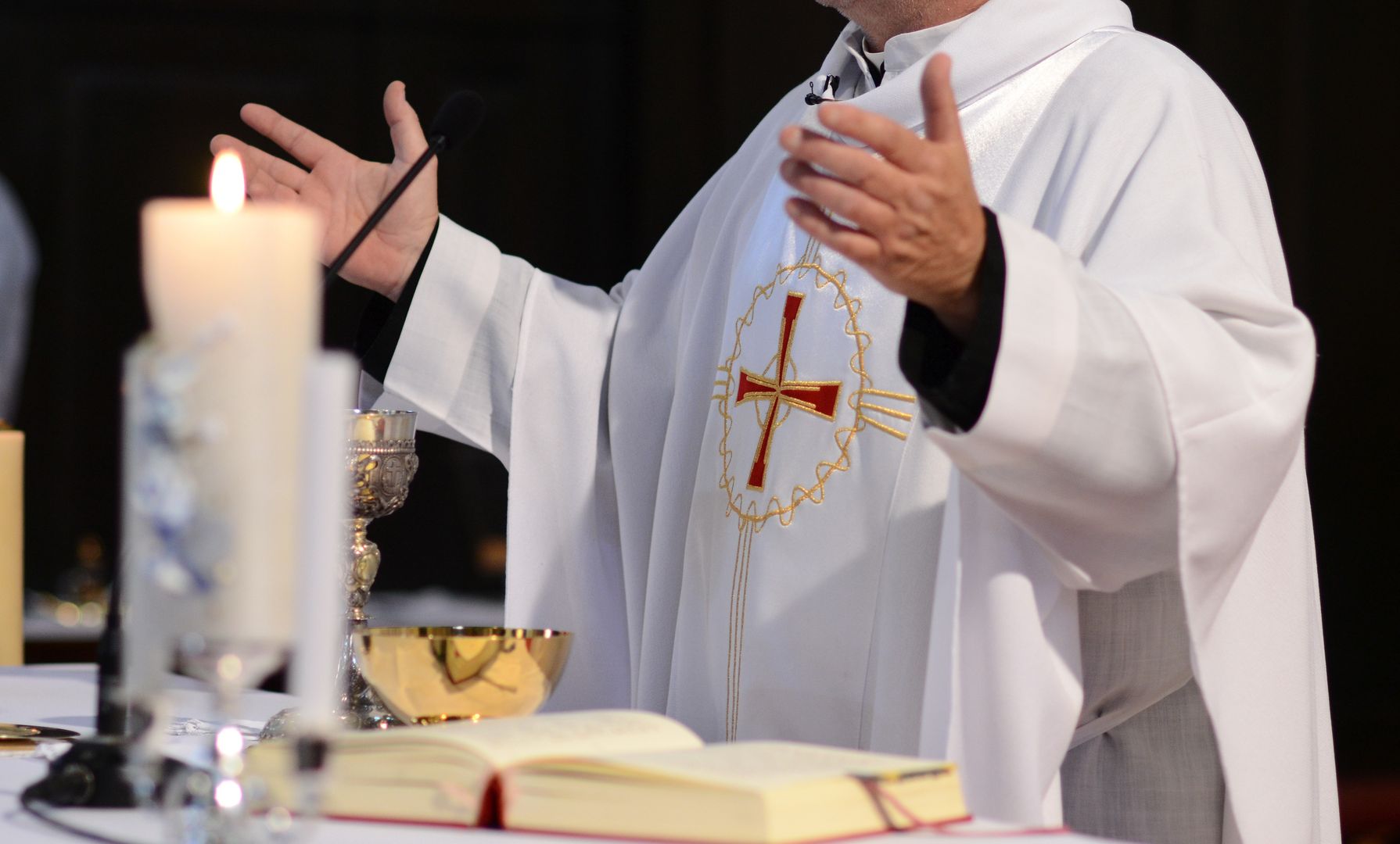 priest and worship at the altar