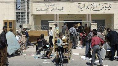 Szabrownicy w Mosulu (fot. AFP)