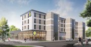 Lidl wchodzi w budowlankę. Na dole sklep, na górze mieszkania