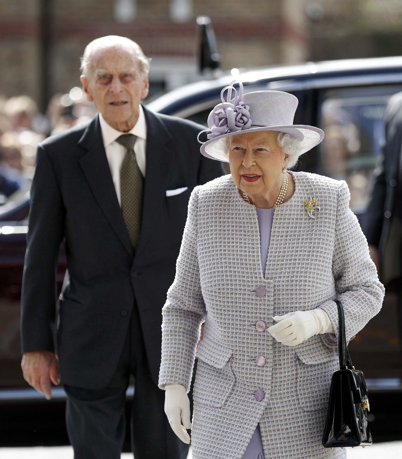 Britain's Queen Elizabeth and Prince Philip arrive at Priory View, an independent living scheme for older residents, in Dunstable, Britain April 11, 2017.