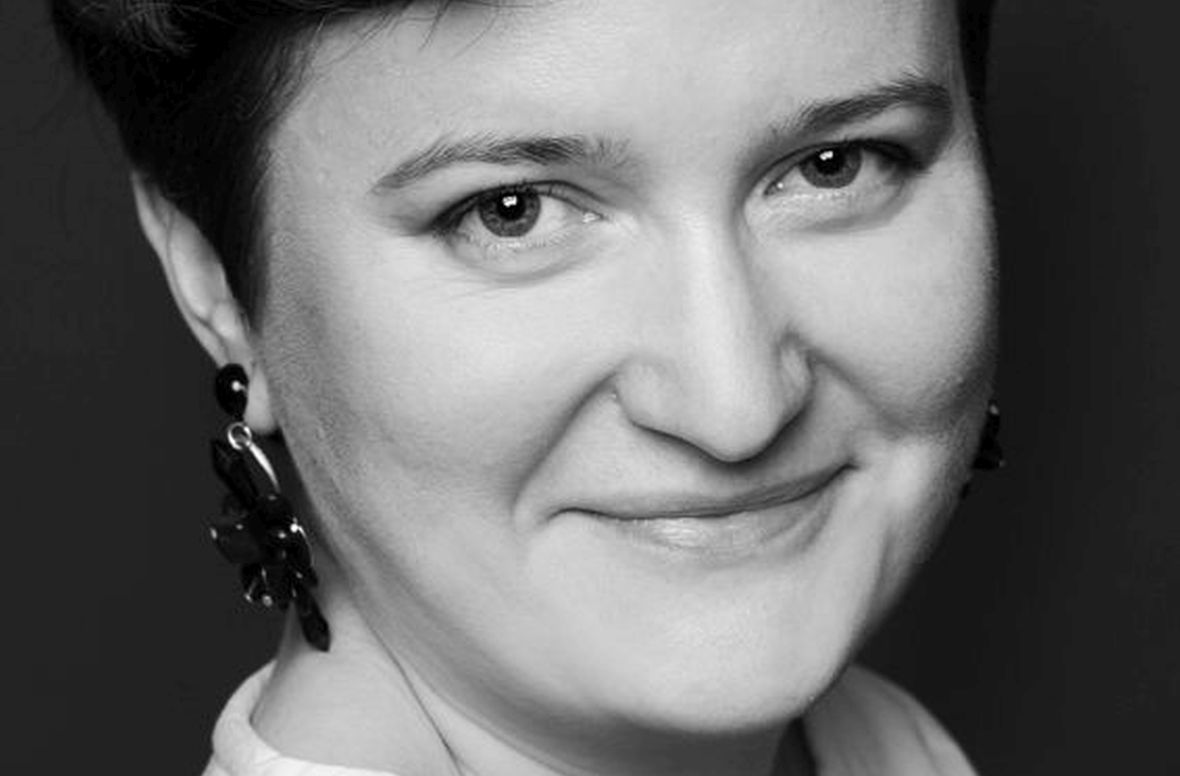 Anna Wibig, fotografka specjalizującasię w reportażach z narodzin. 