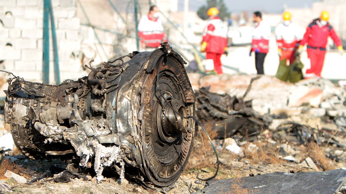 TEHRAN, IRAN - 2020/01/08: Rescue team at the crash site of a Ukrainian airliner that burst into flames shortly after take-off from Tehran on Wednesday, killing all 176 people aboard in a crash. (Photo by Mazyar Asadi/Pacific Press/LightRocket via Getty Images)