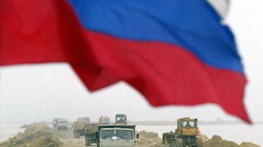 Rosyjska flaga nad groblą