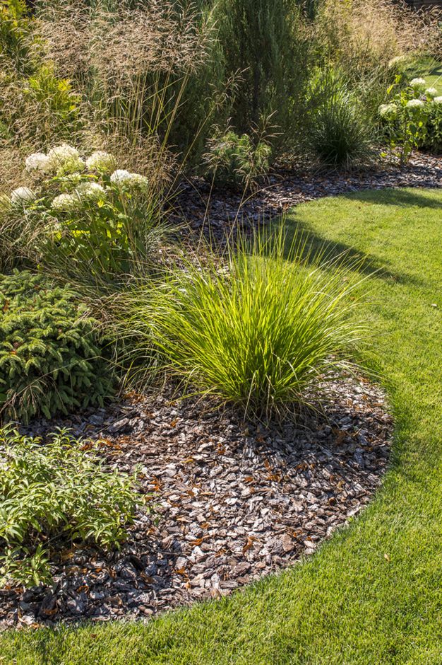 bed with bark in landscape design