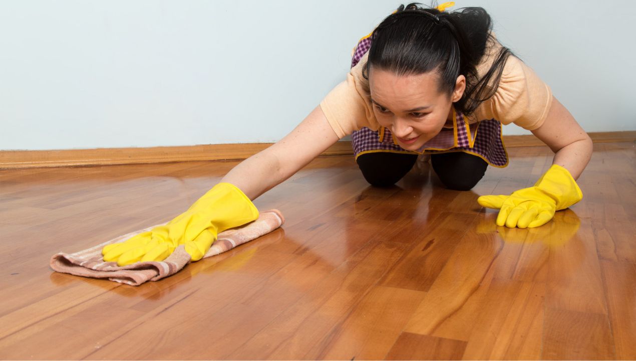 How to clean a dark, wooden floor photo. freepik
