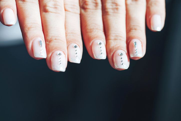 Fingers of a Woman with Decorated Nails 