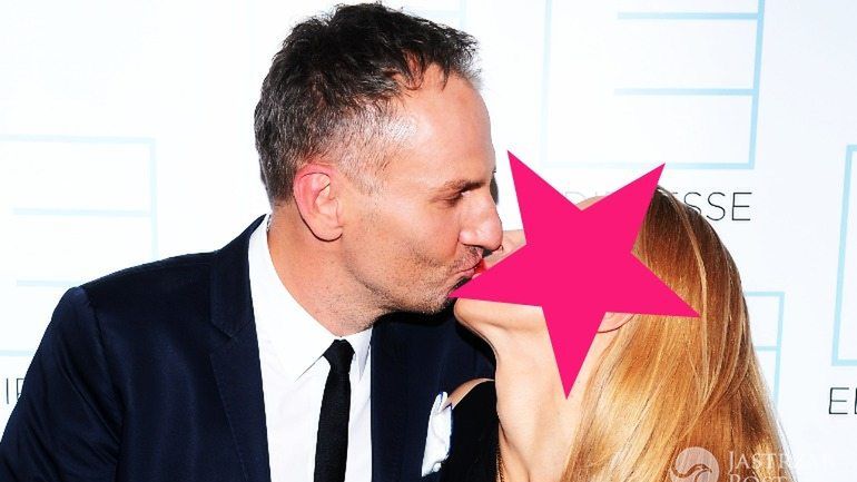 Krzyszfof Gojdź i Kasia Warnke całują się na ściance