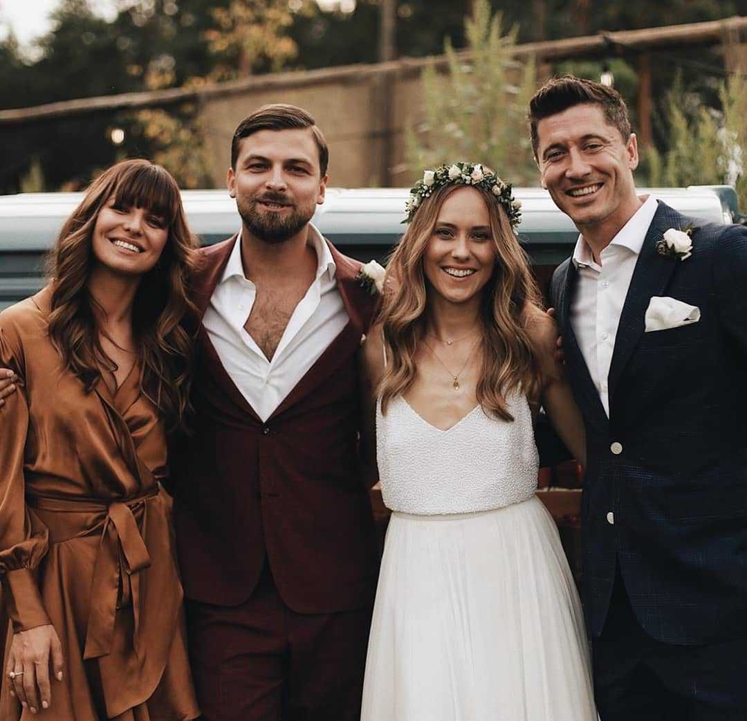 Anna Lewandowska i Robert Lewandowski na ślubie Tomasza Zawiślaka