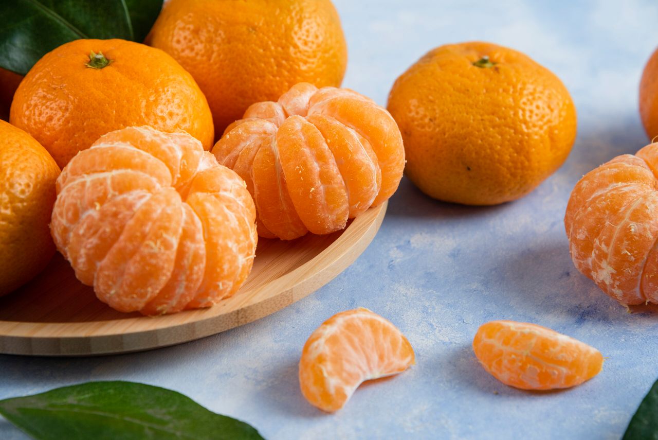 Close up photo of Fresh organic mandarins. High quality photo
