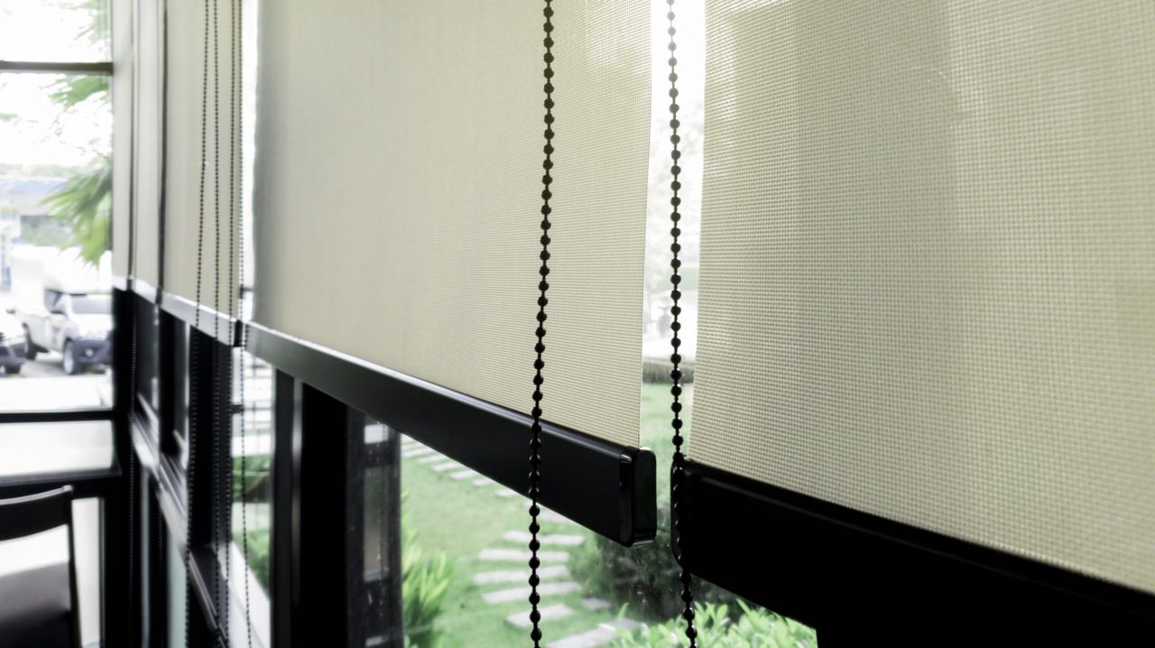 Blind on glass window, Transparent mirror window frame with curtain to protect sun light, Flare light through the window in the morning