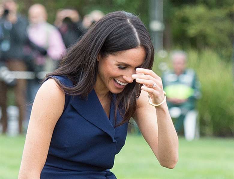 Meghan Markle z ciążowym brzuszkiem i książę Harry w Melbourne