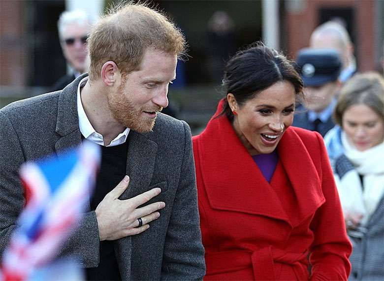 Meghan Markle z ciążowym brzuszkiem i książę Harry w Birkenhead