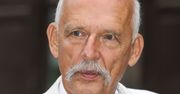 Janusz Korwin-Mikke. Ubrany cały na biało