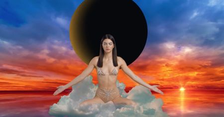 Kendall Jenner siedzi na chmurze w pozycji "kwiat lotosu" i medytuje. Nowa sesja