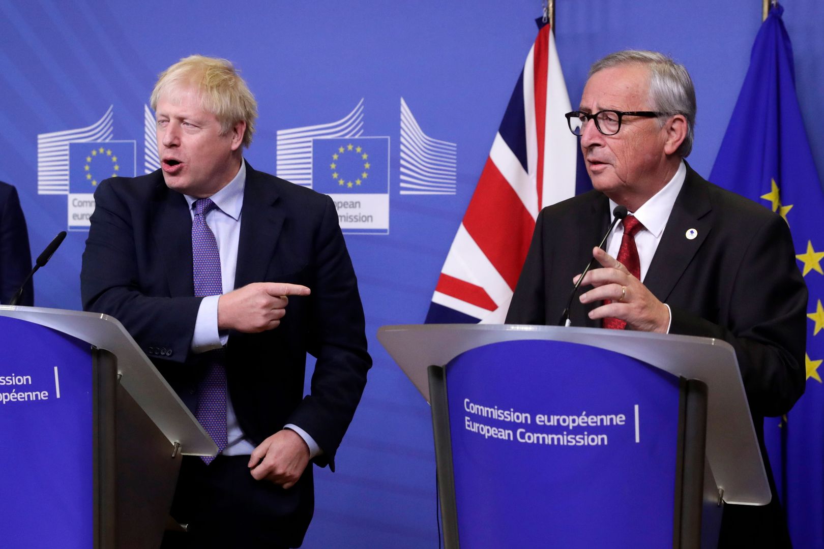 Brexit. Brytyjski premier Boris Johnson i Jean-Claude Juncker