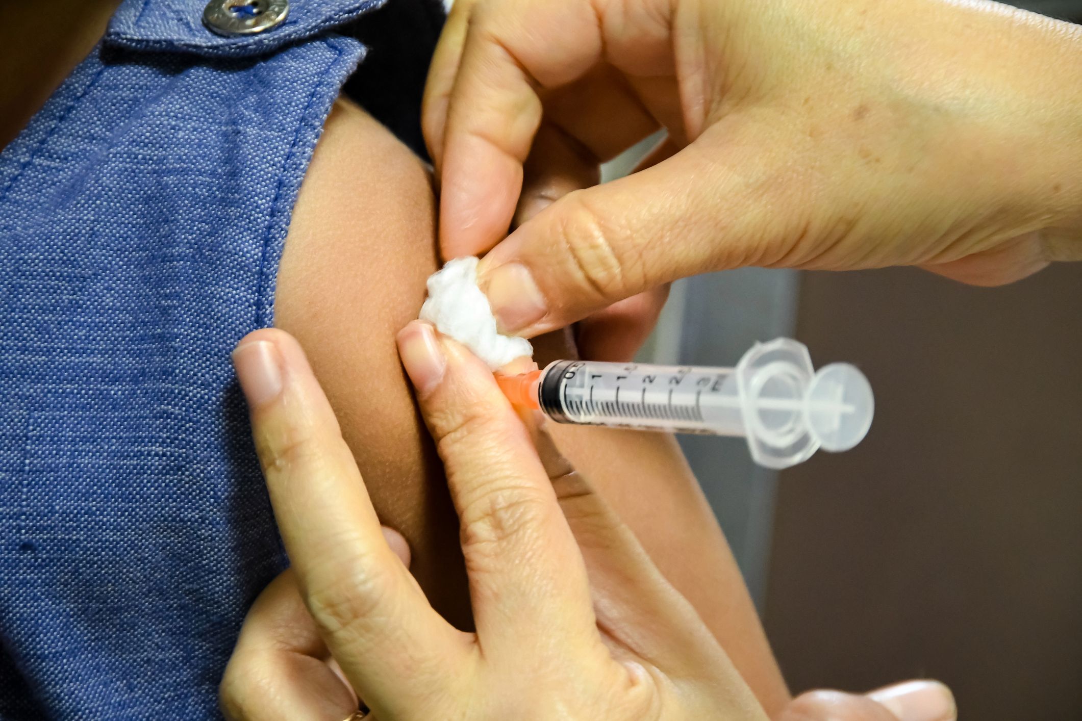 Children receiving vaccine at shoulder .Children vaccine.