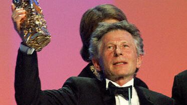 Roman Polański z Cezarem