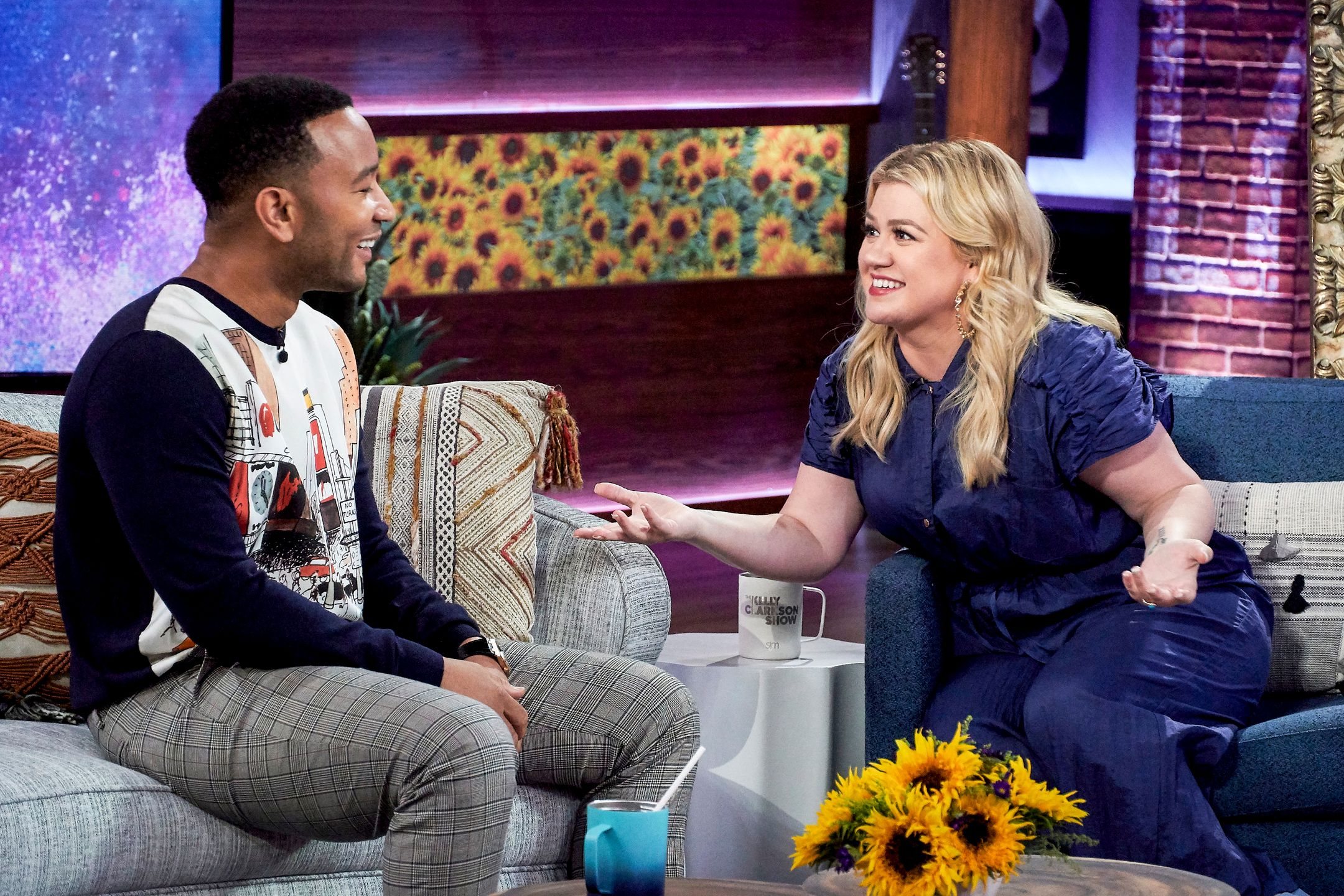 THE KELLY CLARKSON SHOW -- Episode 3011 -- Pictured: (l-r) John Legend, Kelly Clarkson -- (Photo by: Adam Torgerson/NBCUniversal/NBCU Photo Bank) 