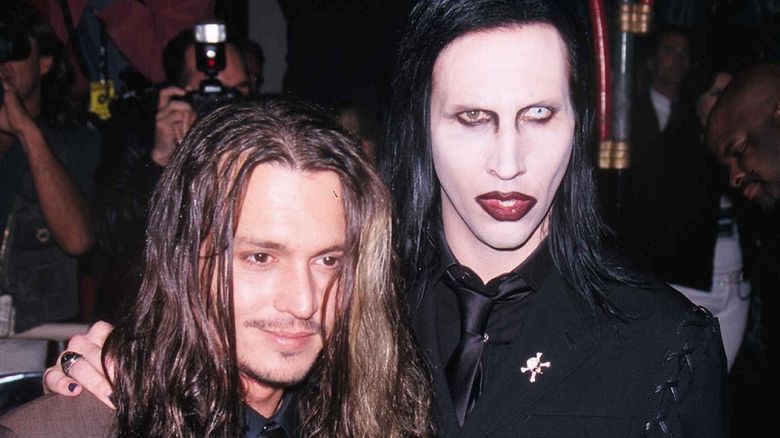 JOHNNY DEPP, MARILYN MANSON
American Pop Singer
Attending the Los Angeles premiere of the film "Blow"                                                                               Bandphoto Agency Photo
B55 075891   29.03.2001