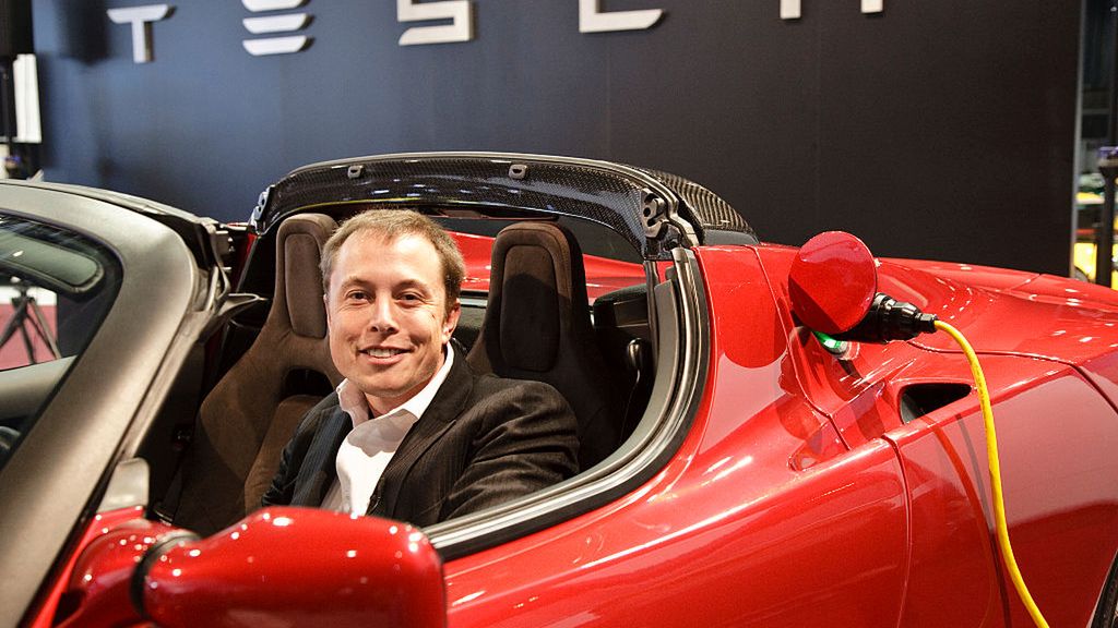 Elon Musk , Chairman of the board of directors and CEO of Tesla Motors (former President  and founder of Paypal) at a Tesla Motors press conference at the 2009 North American Auto Show.  Tesla makes the Tesla Roadster which is an all-electric sports car