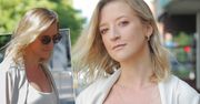 Ciężarna Lara Gessler w białej sukience przed studiem DDTVN. Od jej brzuszka nie można oderwać wzroku