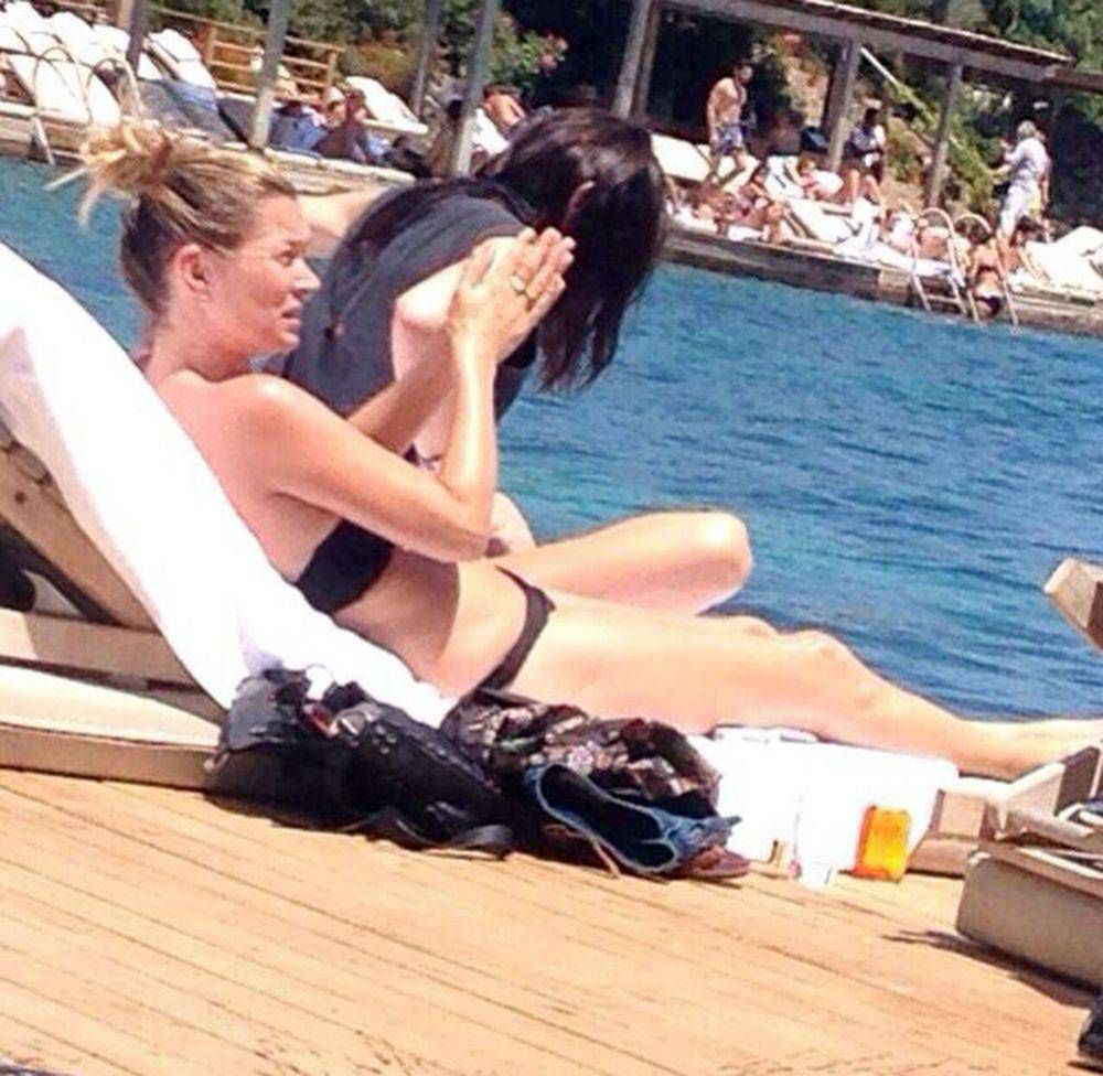 03.AUGUST.2014 - TURKEY

**EXCLUSIVE PICTURES**

**STRICTLY NOT AVAILABLE FOR UK**

BRITISH SUPERMODEL KATE MOSS TAKING TIME OUT TO RELAX AT A PRIVATE HOTEL HOLIDAY VILLAGE CALLED LIFE CO BODRUM CENTRE WHICH IS A DETOX SPA CENTRE IN TURKBUKU, BODRUM, TURKEY.
KATE IS SEEN DRINKING HER DETOX TEA AND ENJOYES A REST NEAR THE POOL OF THE HOTEL AS HE SUNBATHES AND SWIMS AT THE HOTEL.

BYLINE MUST READ : XPOSUREPHOTOS.COM

***UK CLIENTS - PICTURES CONTAINING CHILDREN PLEASE PIXELATE FACE PRIOR TO PUBLICATION ***

PLEASE CREDIT USAGE AS PER **UK CLIENTS MUST CALL PRIOR TO TV OR ONLINE USAGE PLEASE TELEPHONE +44 208 344 2007