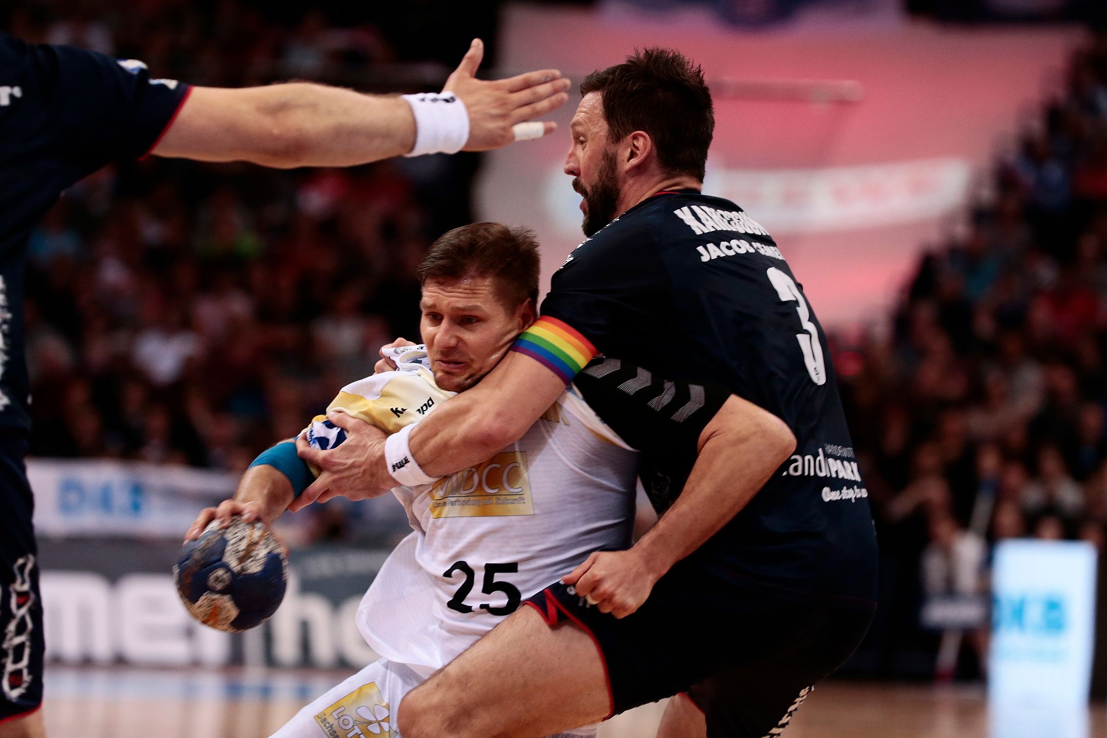 (L) of Flensburg challenges for the ball with  (R) of Magdeburg during the DKB REWE Final Four Finale 2016 between SG Flensburg Handewitt and SC Magdeburg at Barclaycard Arena on May 1, 2016 in Hamburg, Germany. 