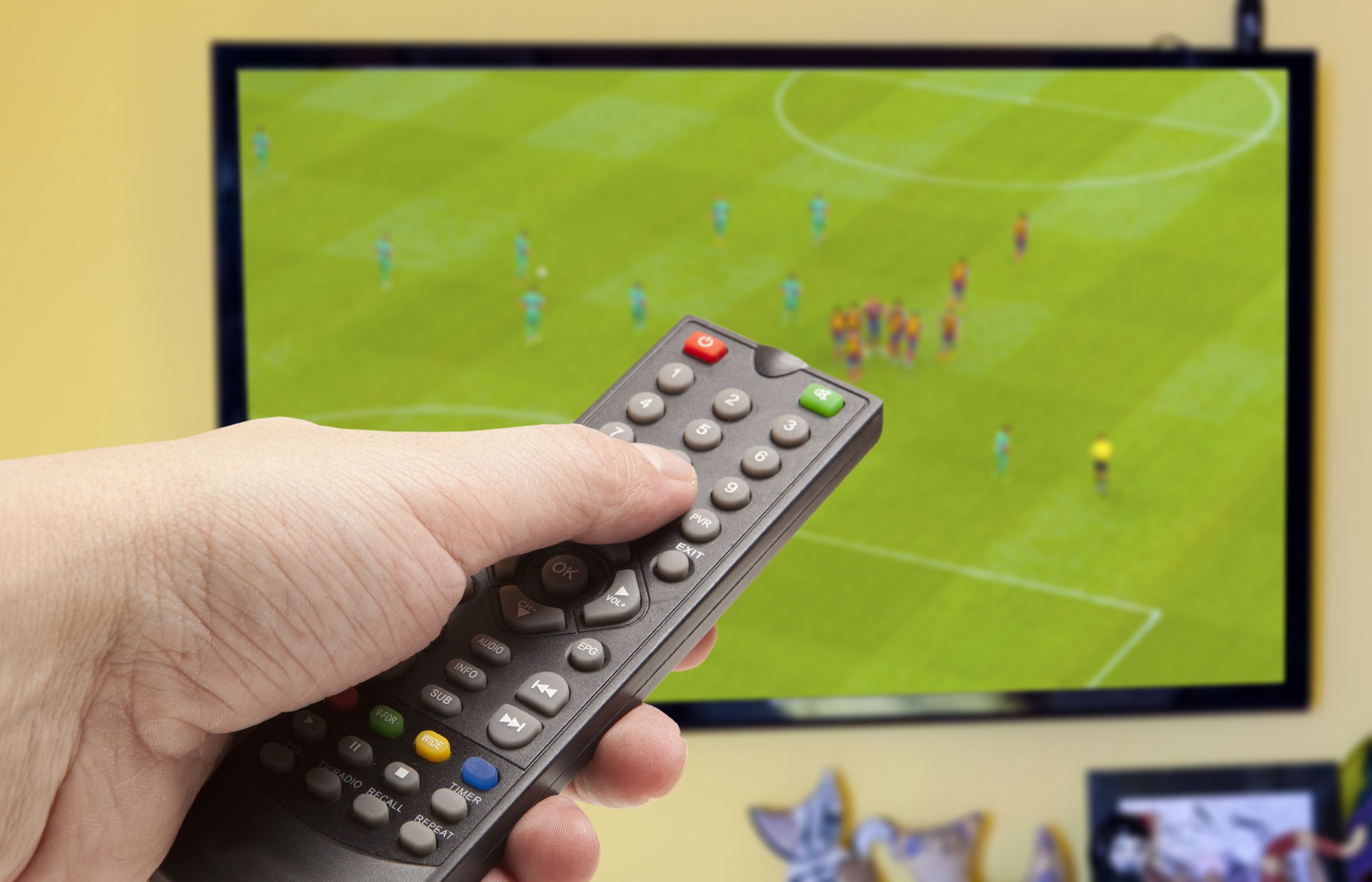 Watching soccer game on TV  