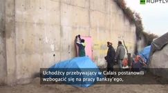 Uchodźcy w Calais zarabiają na muralu Banksy'ego 