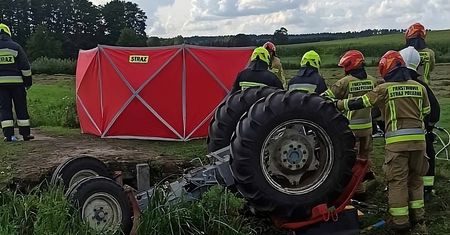 Mężczyzna zginął przygnieciony ciągnikiem rolniczym